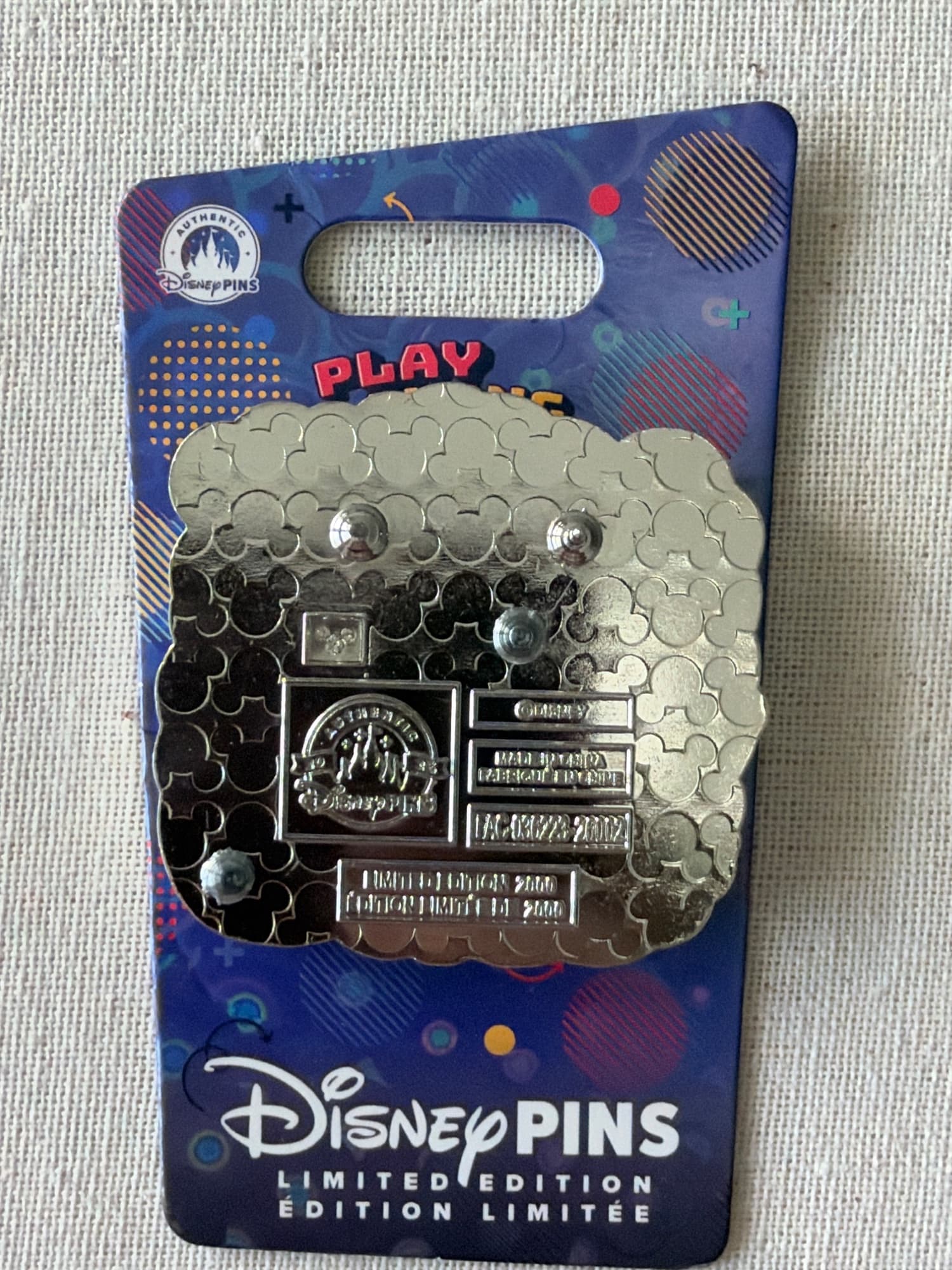 Play Along Genie Pin, the back