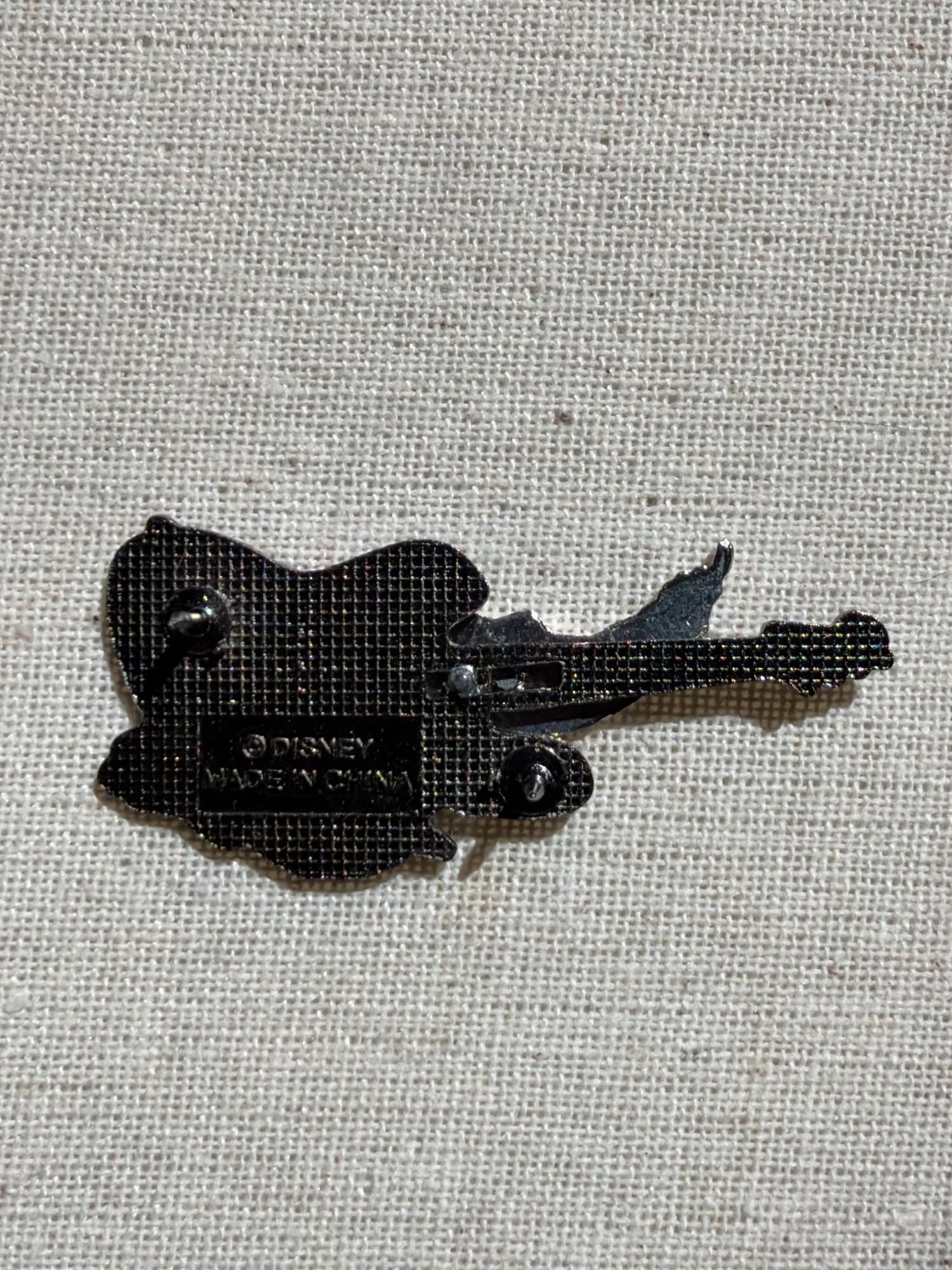 VTG Rock N Roller Coaster Pin, the back