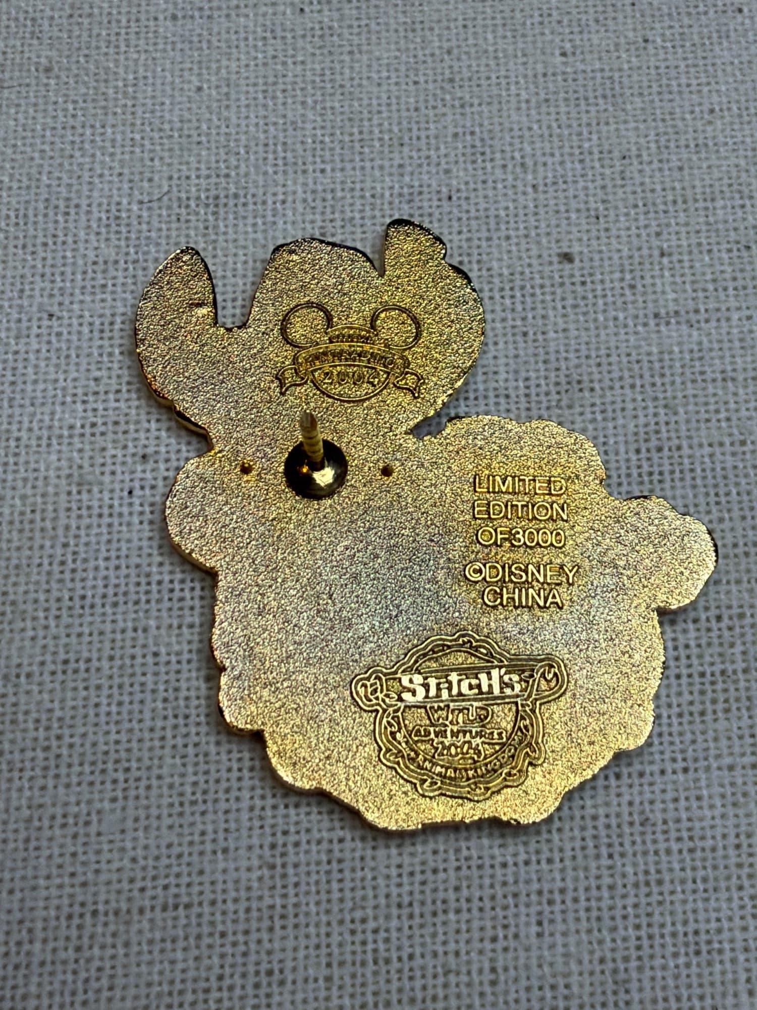Stitch’s Wild Adventures 2004 Pin, the back