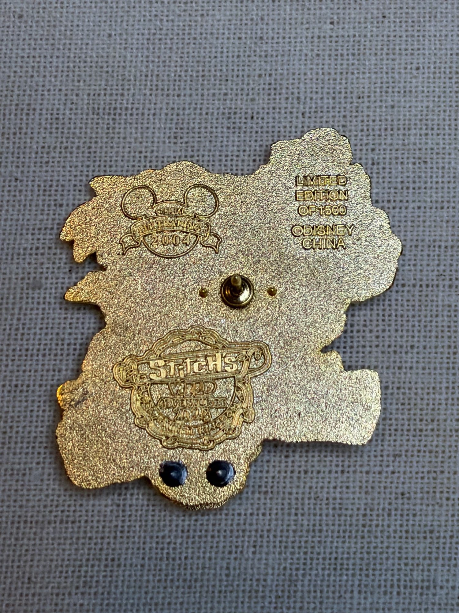 Stitch’s Wild Adventures Wildlife Express Pin, the back
