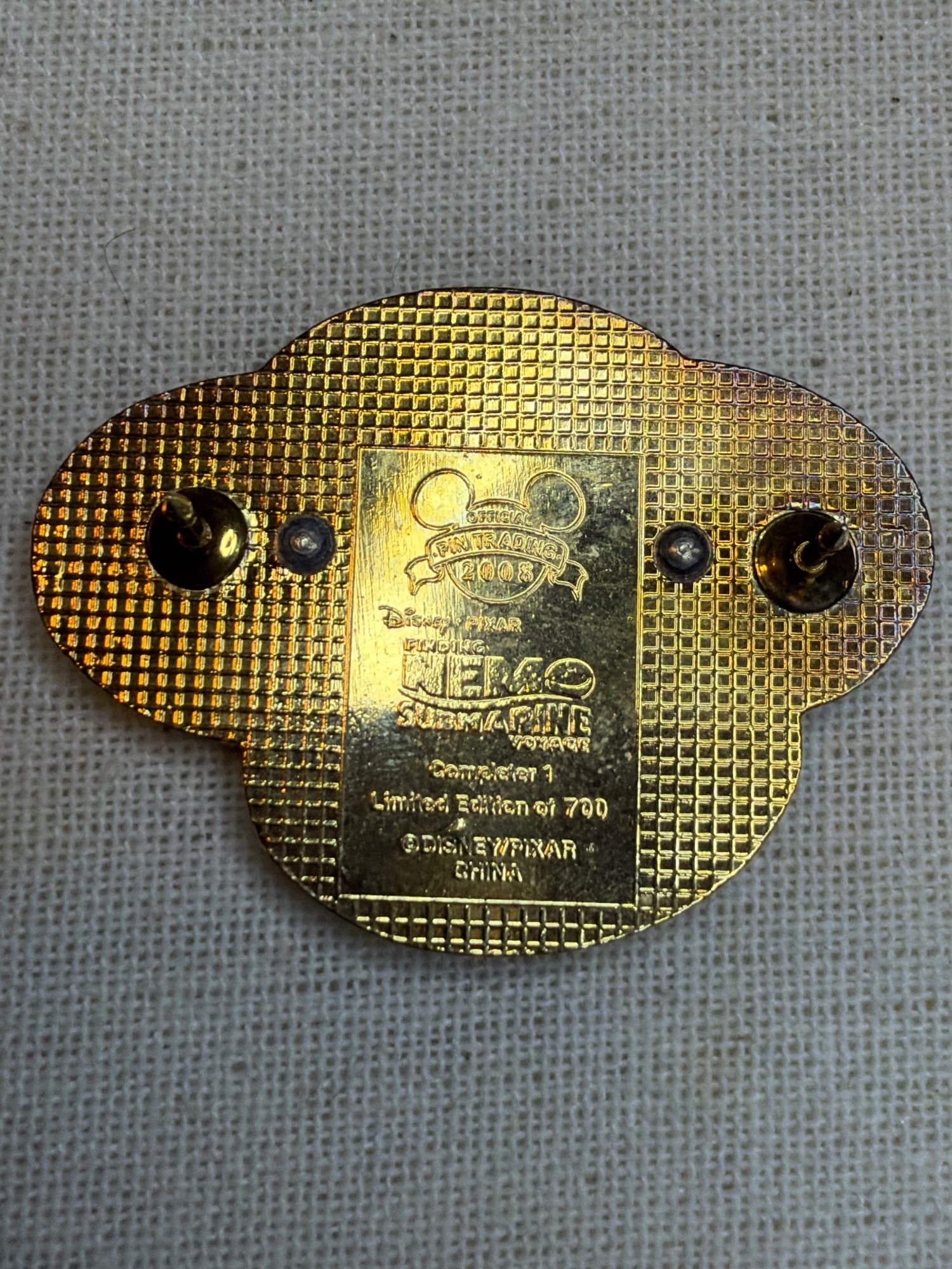 Dory Submarine Voyager Completer Pin, the back