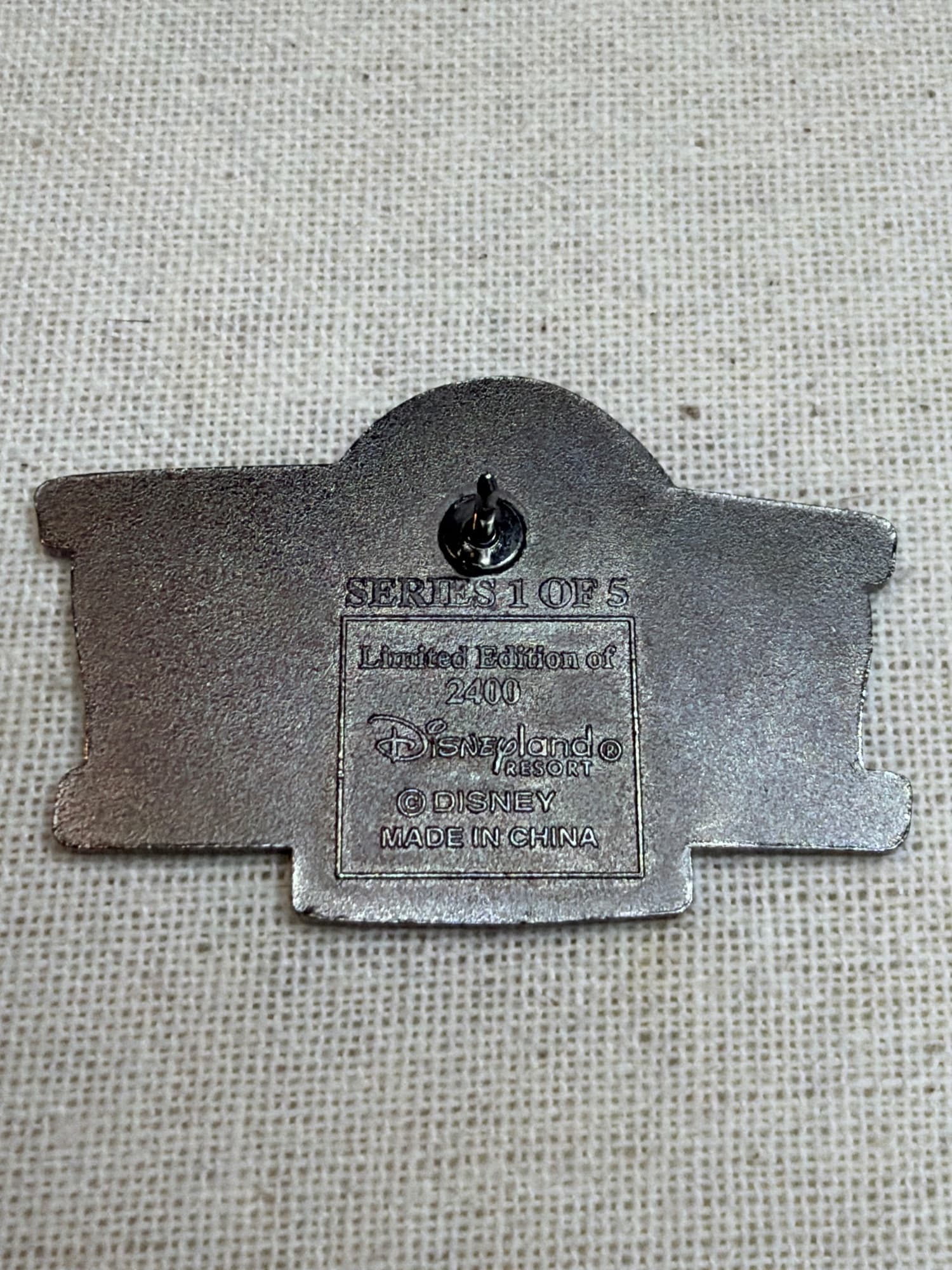 DLR Toontown Pin, the back