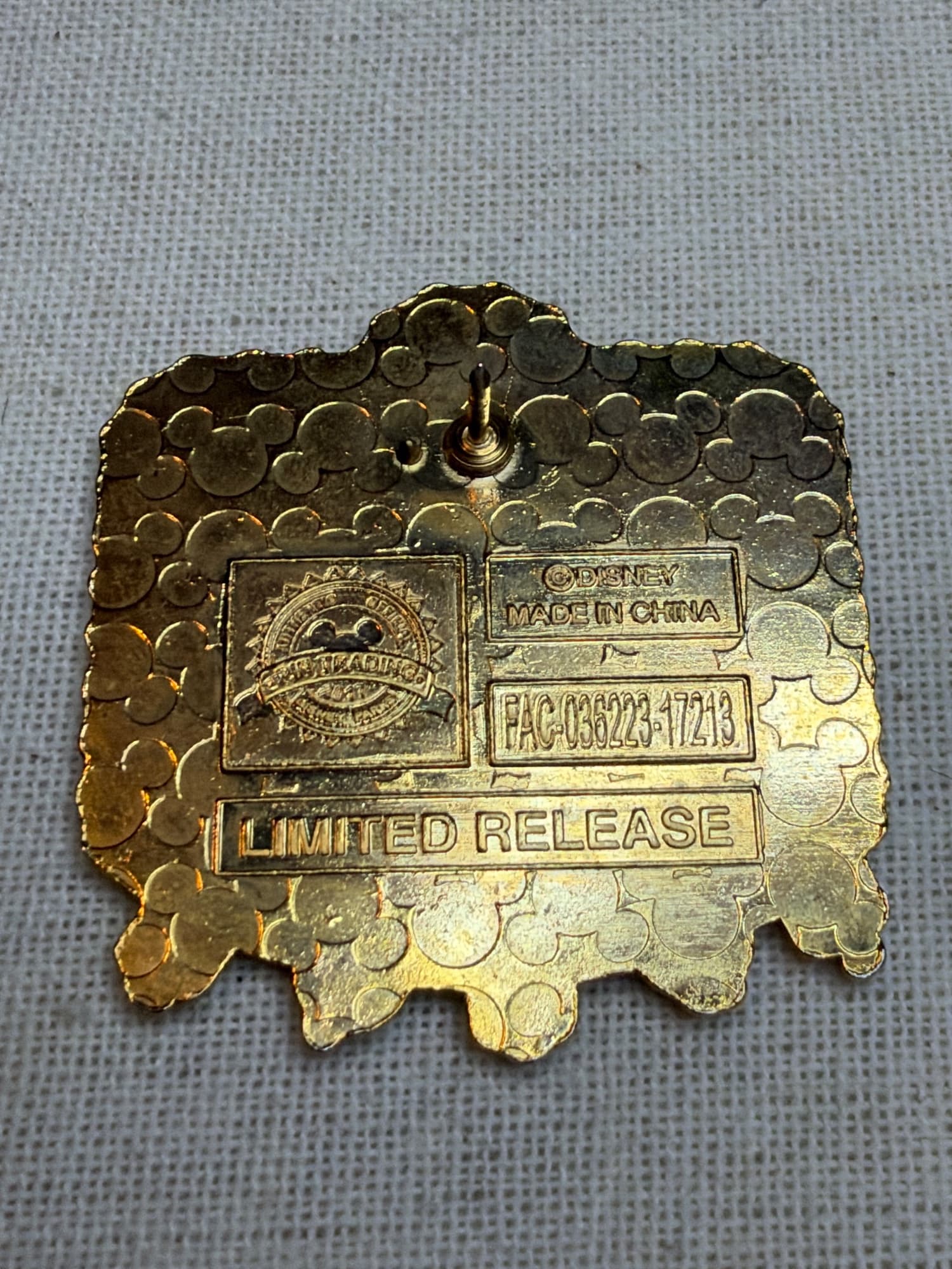 Feliz Navidad Small Word Pin, the back