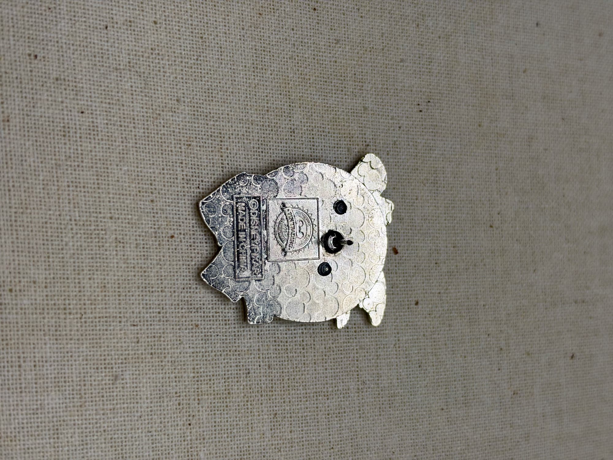 Crush Art of Animation Pin - Retired, the back