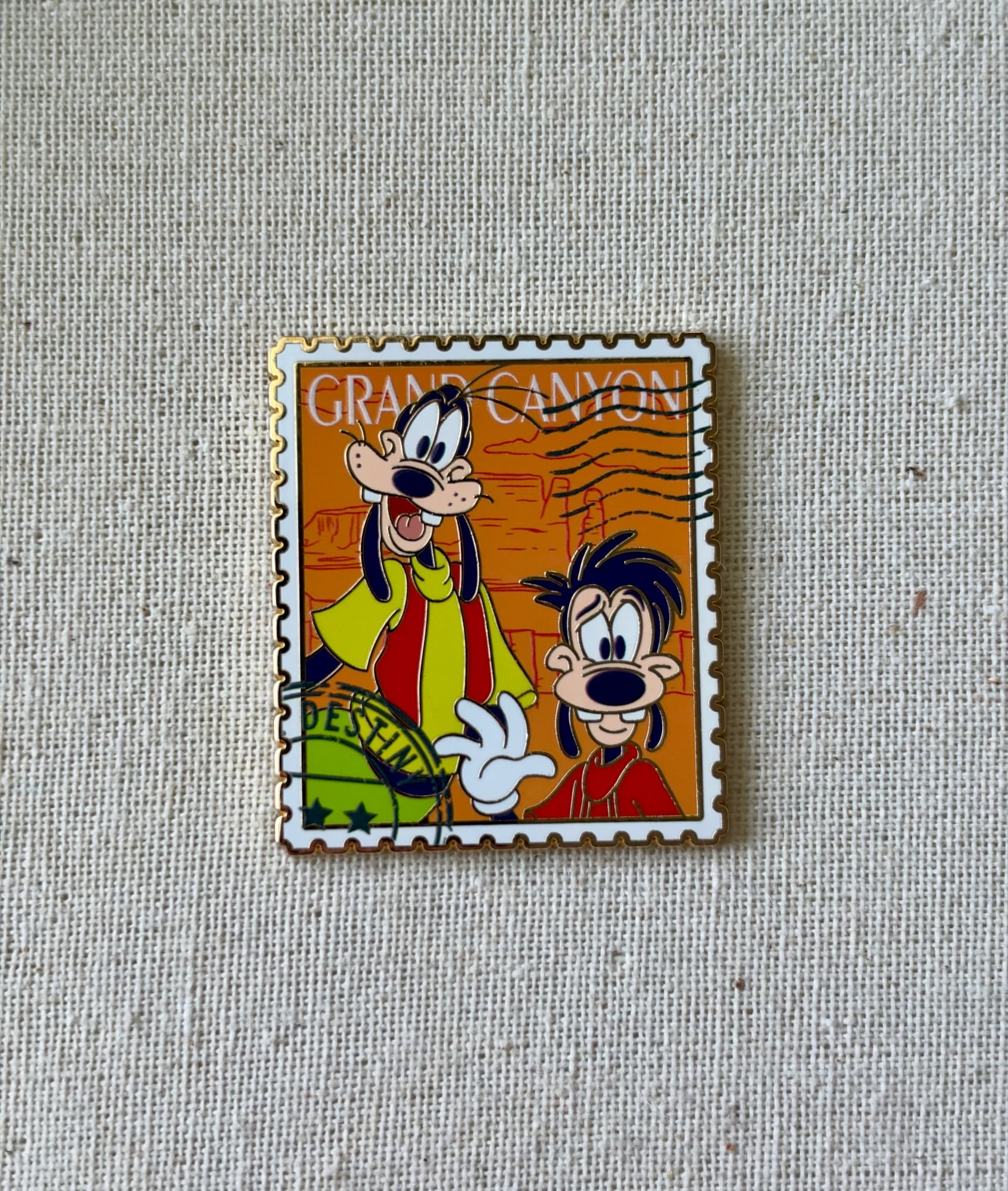 Goofy/Max Grand Canyon Mongram Stamp Pin, the front