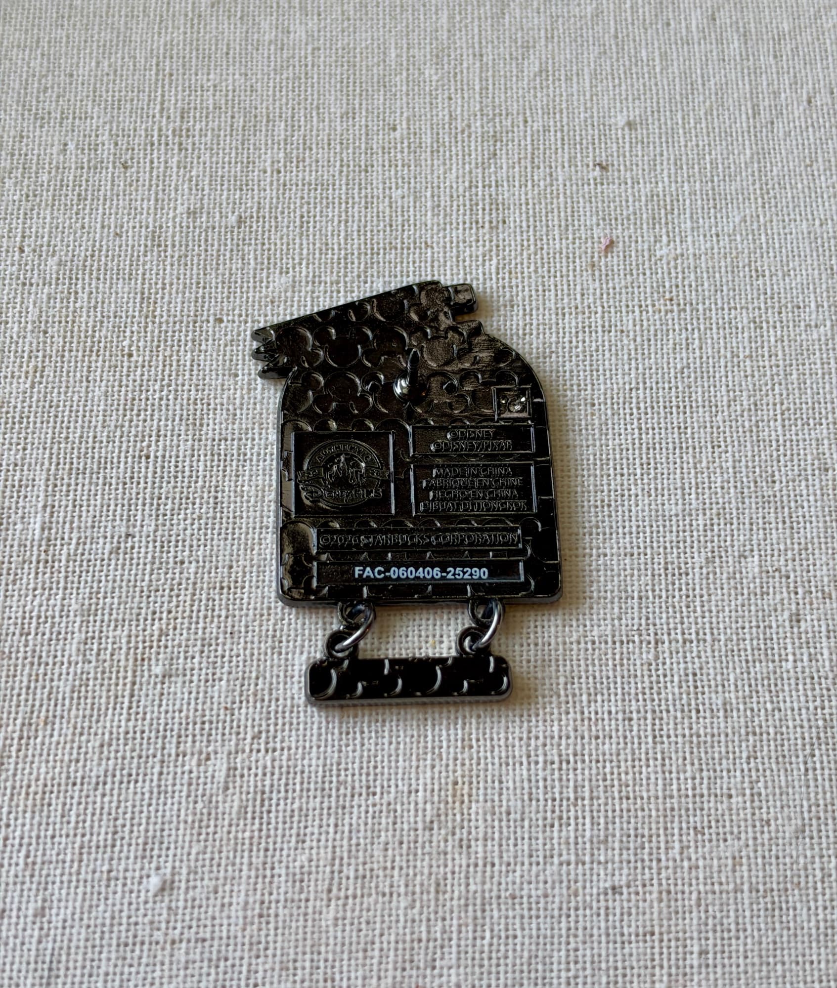 Animal Kingdom Starbucks Pin - Kevin, the back