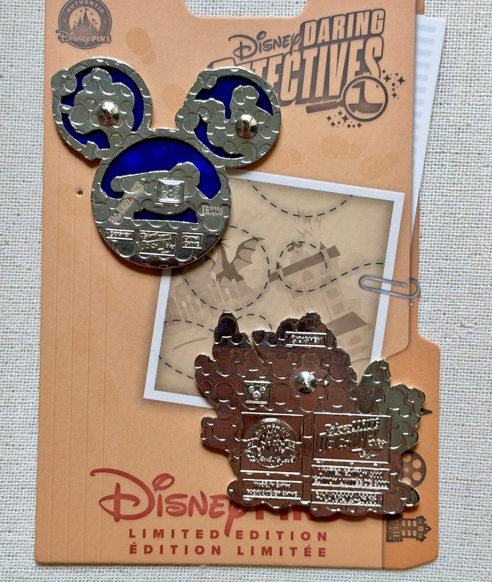 Daring Detectives Fantasmic Pin Set, the back
