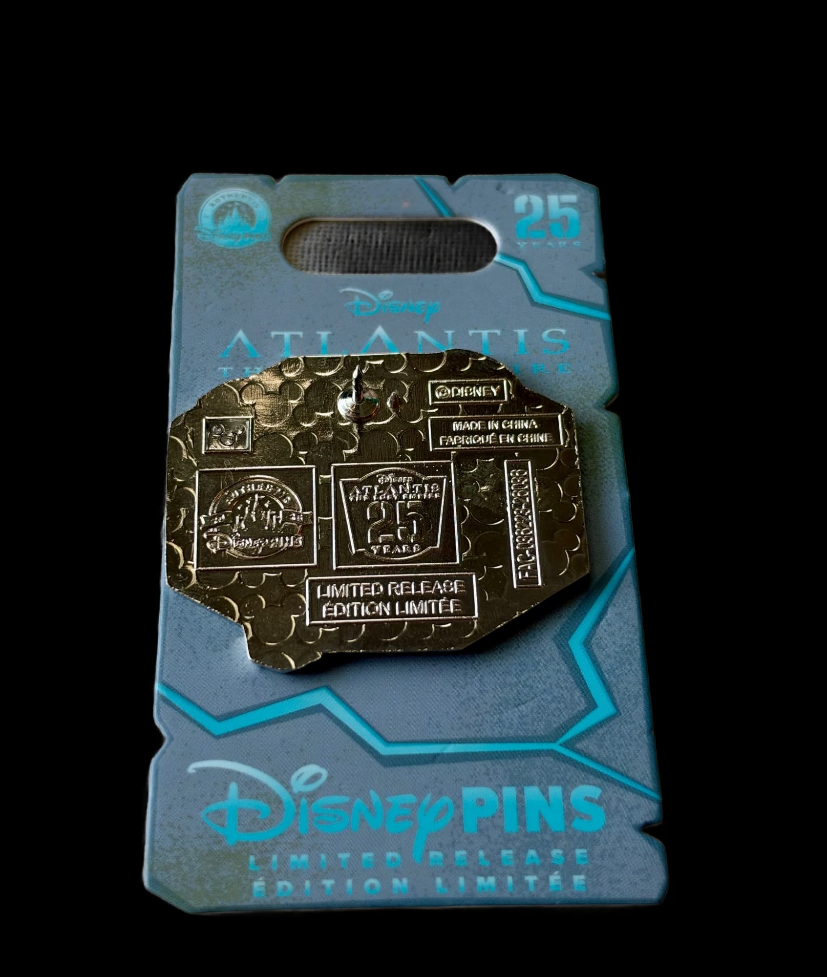 Atlantis 25th Anniversary Pin, the back