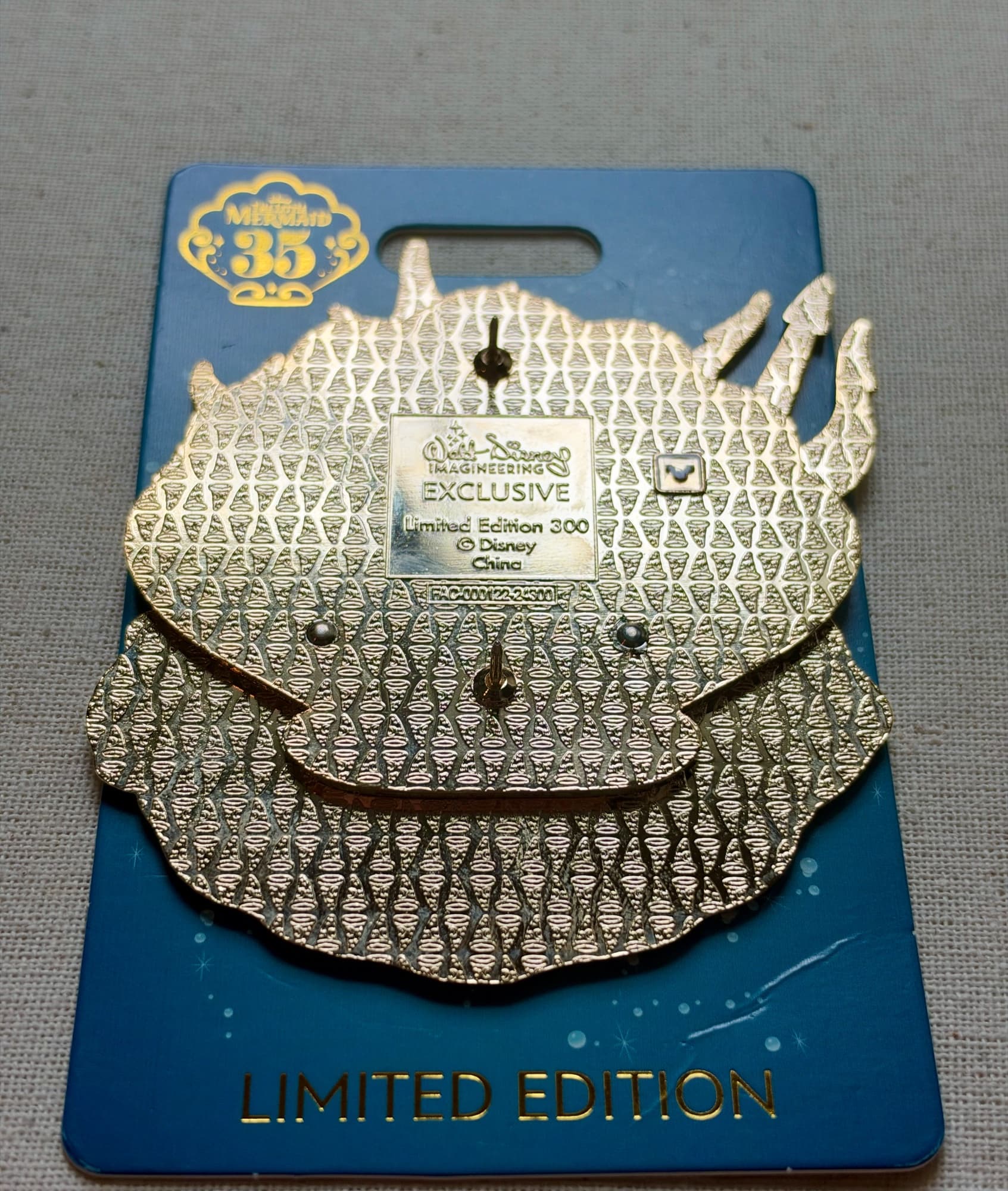 WDI King Triton 35th Anniversary Pin, the back